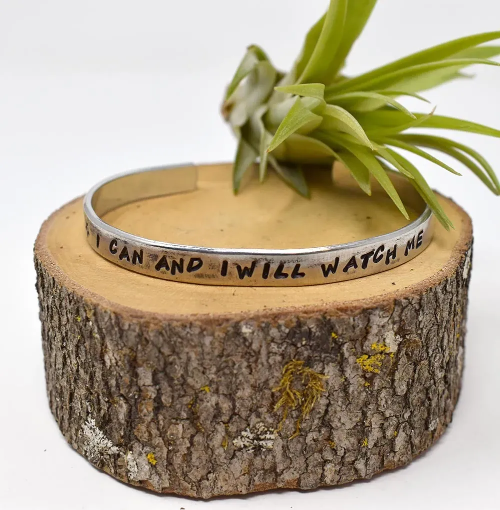 Molly's stamped aluminum cuff that reads I can and I will watch me