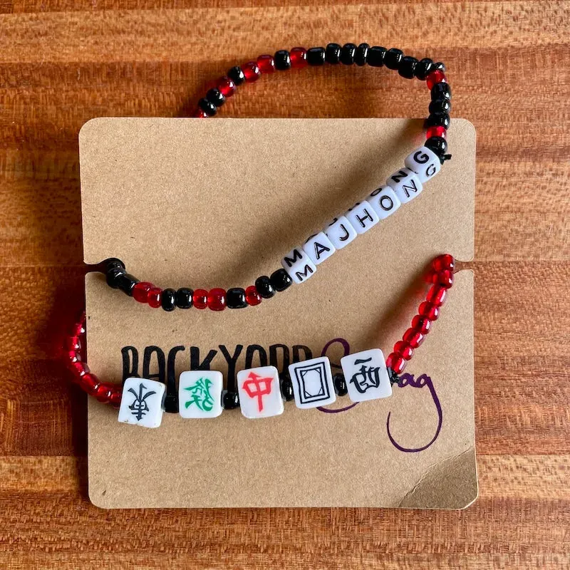 Beaded stretch bracelet that reads Mahjong